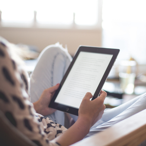woman holding ereader