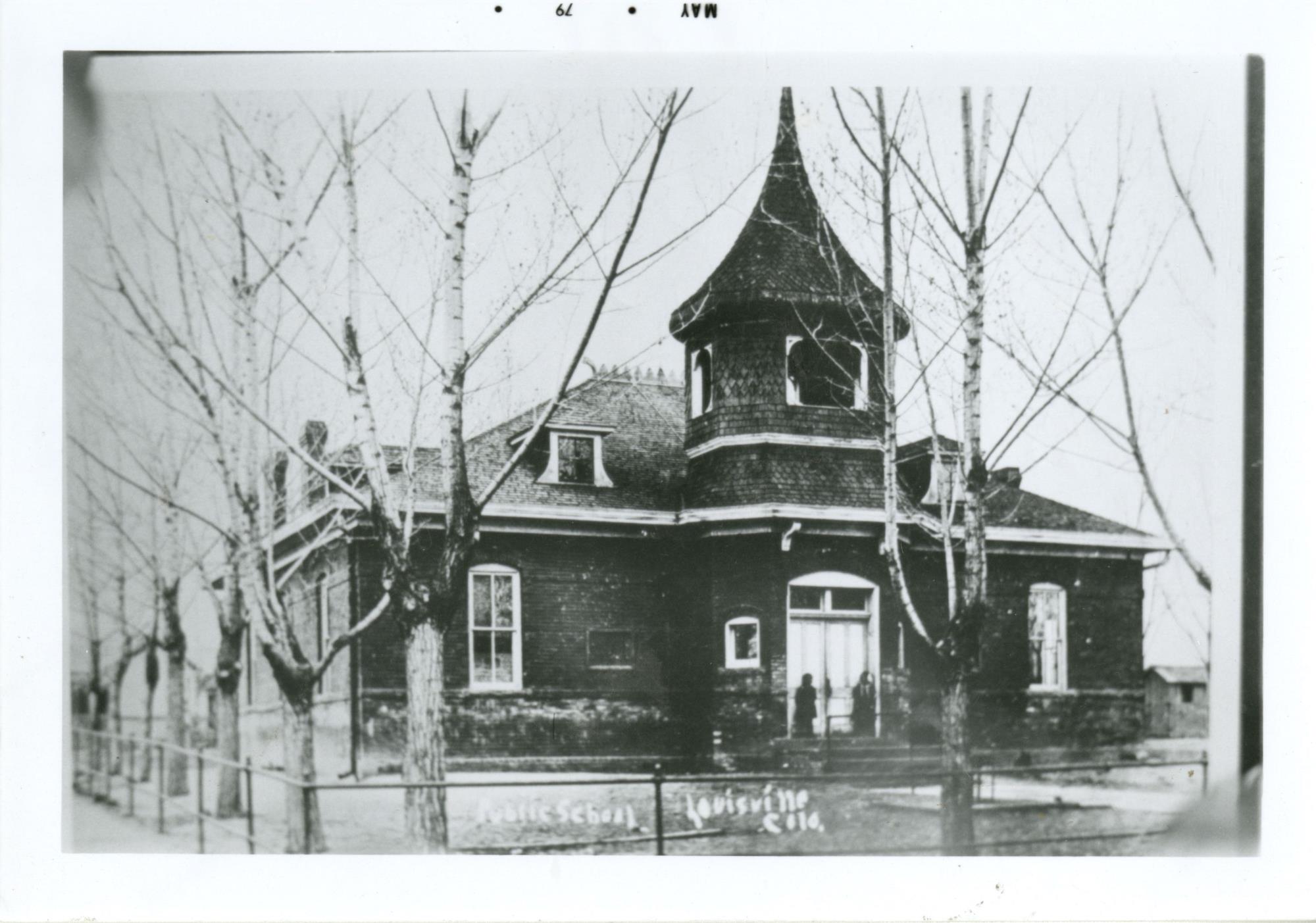 Photograph of 801 Grant Ave. The building is made of brick and has a spire over the front entrance.